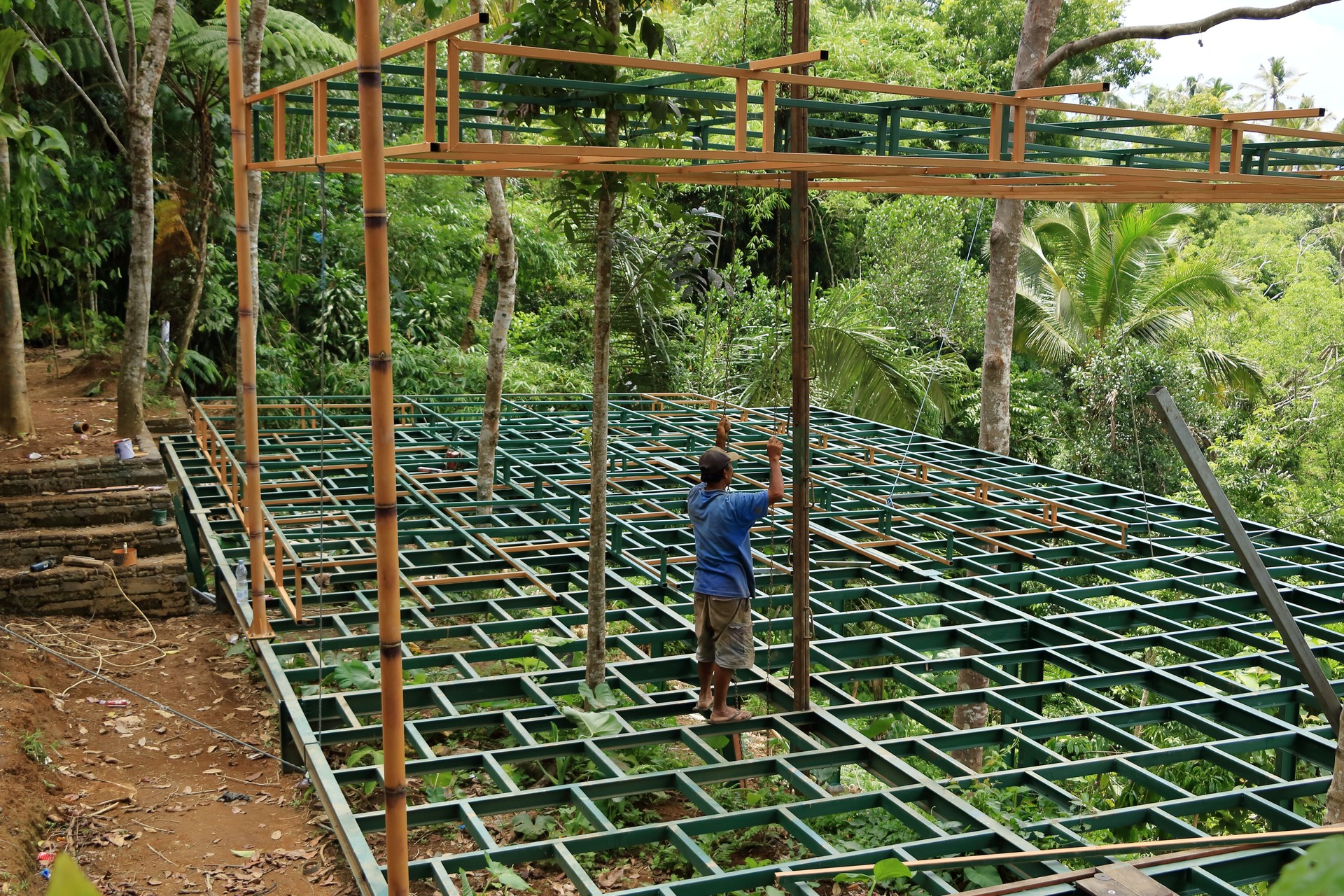 construction workers fixing a new roof